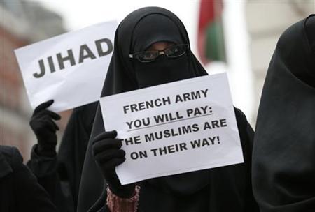 British Islamists protest outside the French Embassy in London January 12, 2013. REUTERS/Suzanne Plunkett